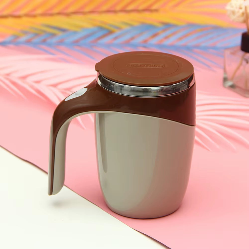 Spill-resistant lid and ergonomic handle design”