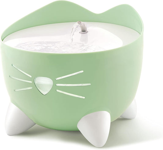 Soft LED indicator on Catit PIXI cat water fountain glowing at night